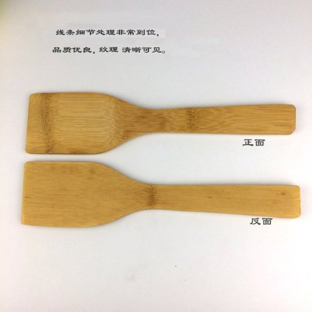 Деревянная лопатка для жареных блюд фотография