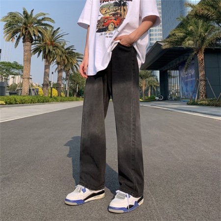 Джинсы с прямым кроем и потертостями фото