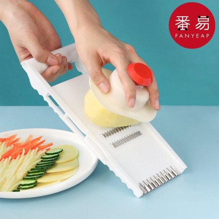 Многофункциональный овощерез фотография